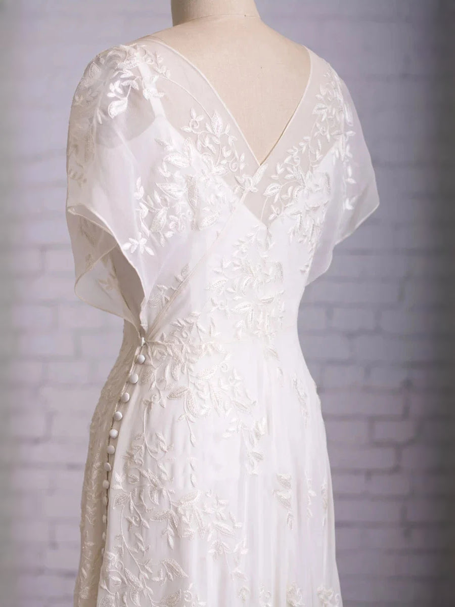 White floor-length wedding dress, alternate view showing the skirt and hem