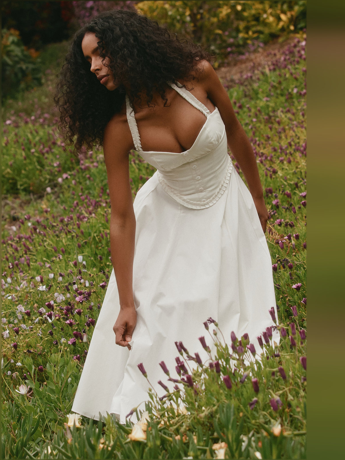 White midi formal dress with halter neckline, alternate view showing the skirt