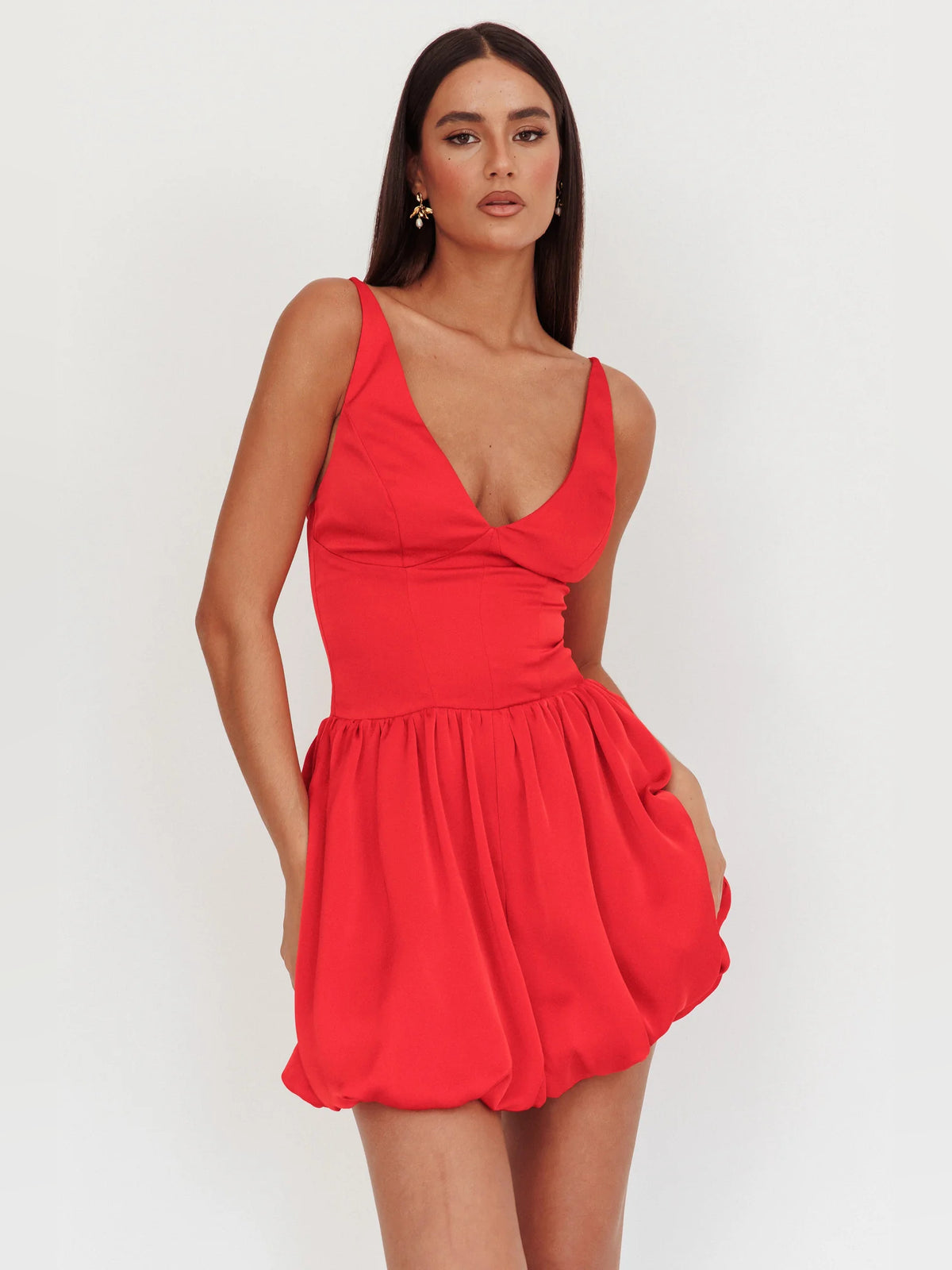 Red mini homecoming dress, alternate view showing the skirt and hem