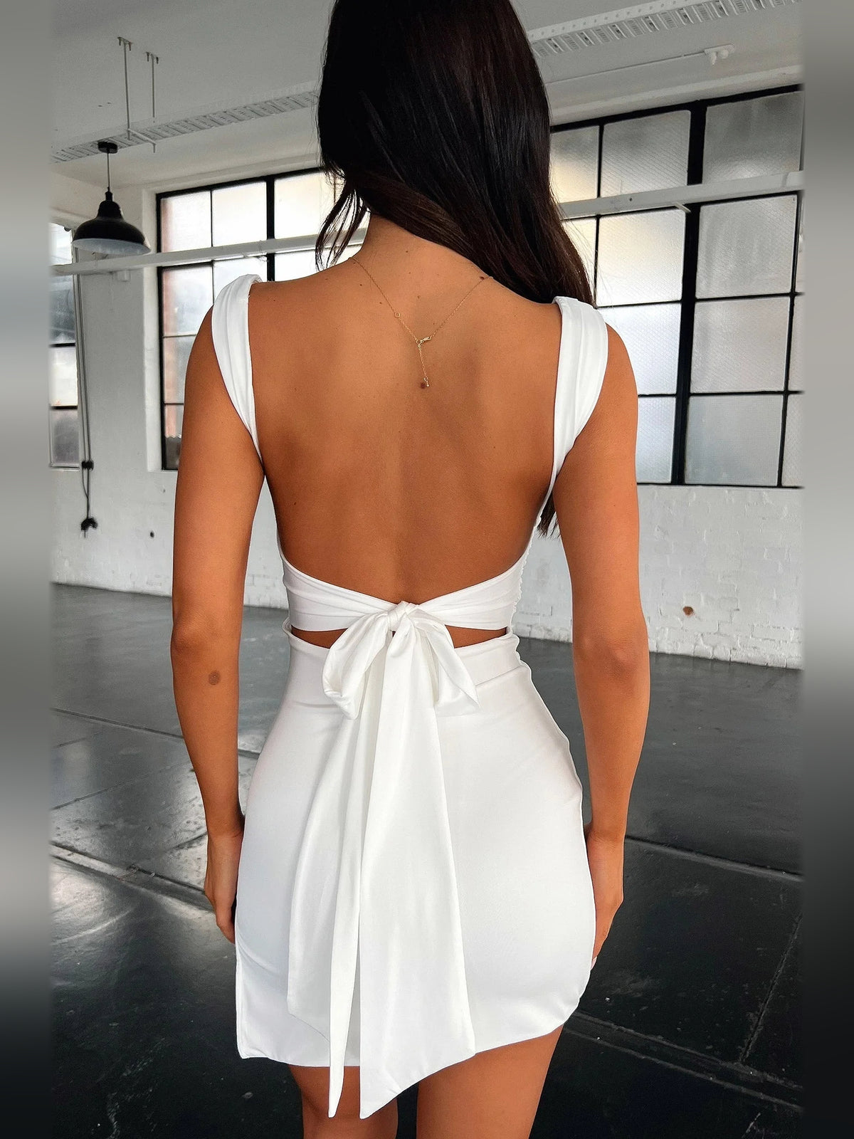 Ivory white mini homecoming dress, alternate view showing the skirt and hem