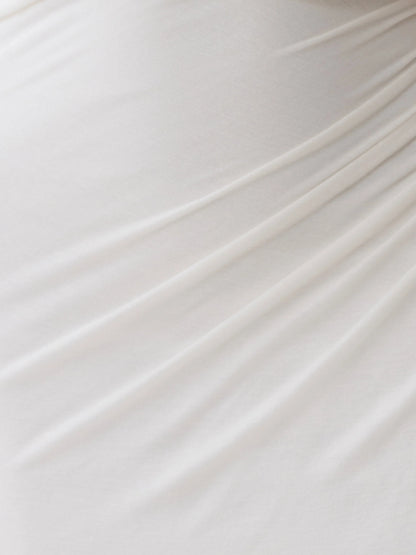 White midi formal dress with draping, alternate view showing the skirt