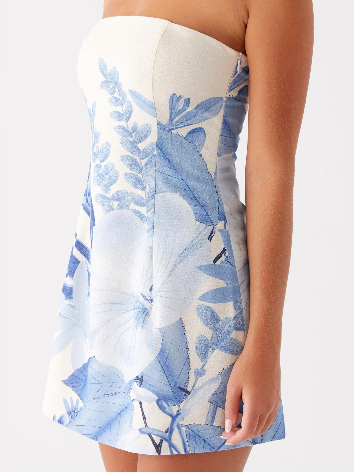 Blue Floral mini homecoming dress, alternate view showing the skirt and hem
