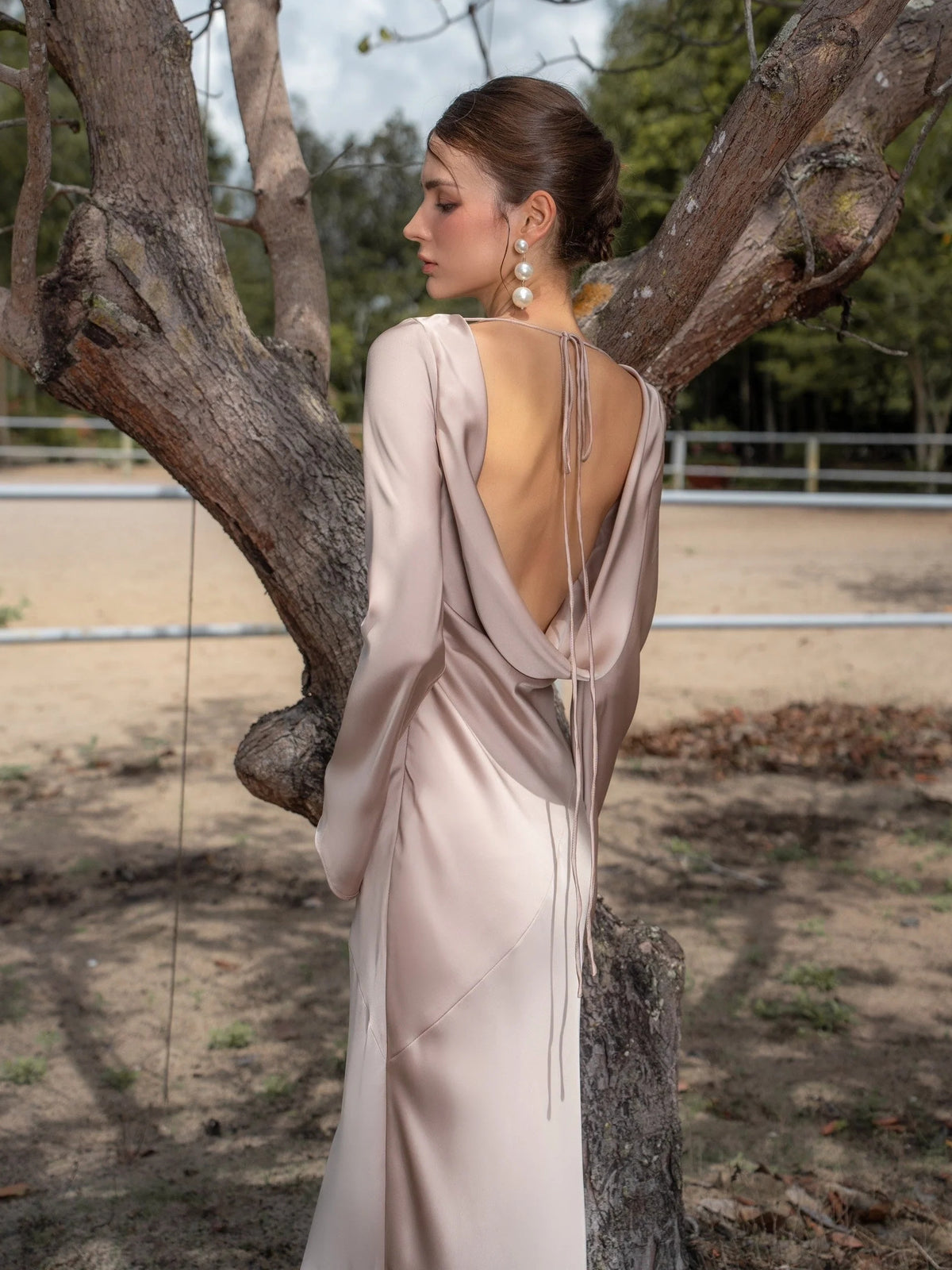 Ivory white maxi prom dress, alternate view showing the skirt and hem