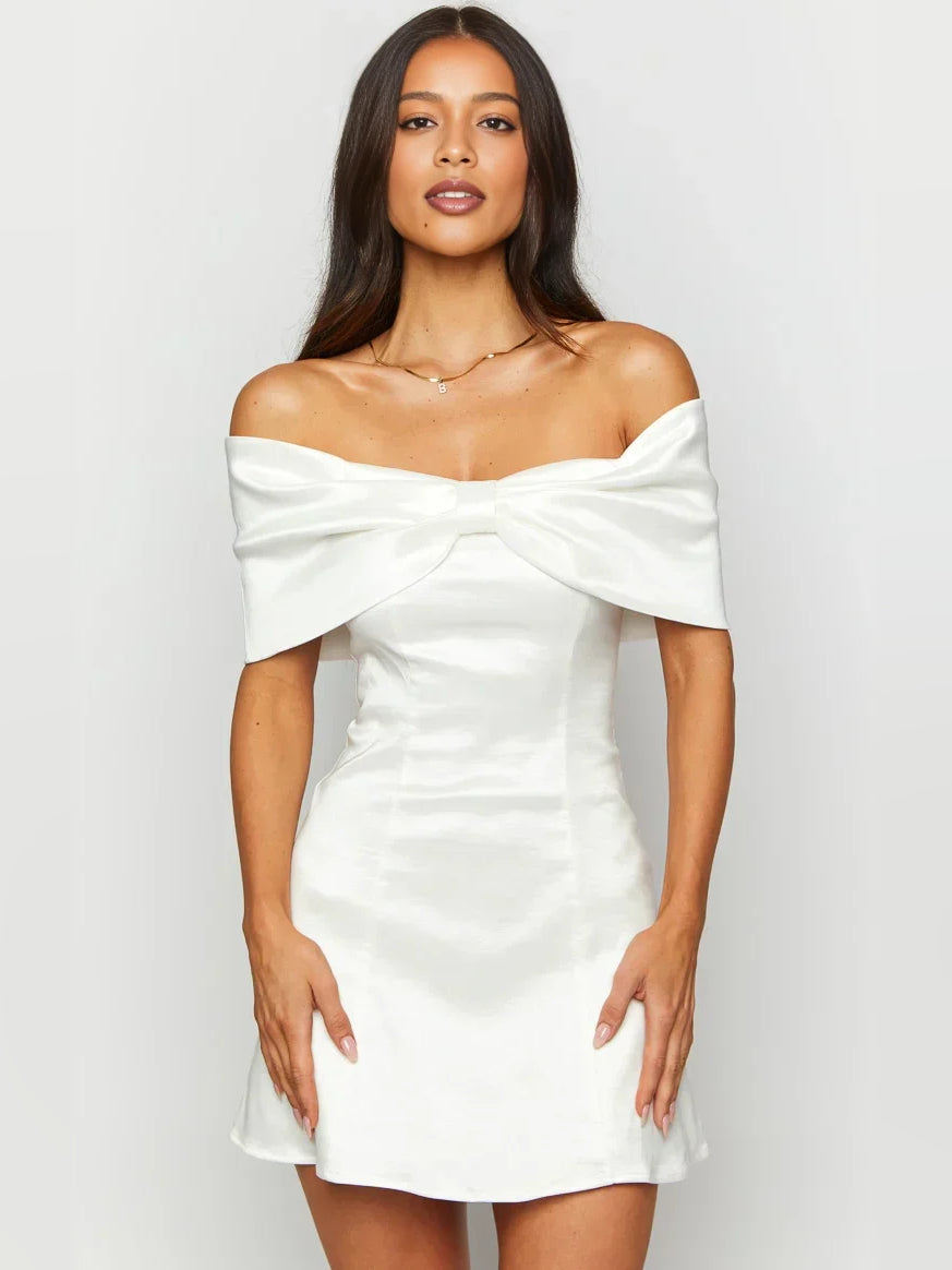 Black mini homecoming dress, alternate view showing the skirt and hem