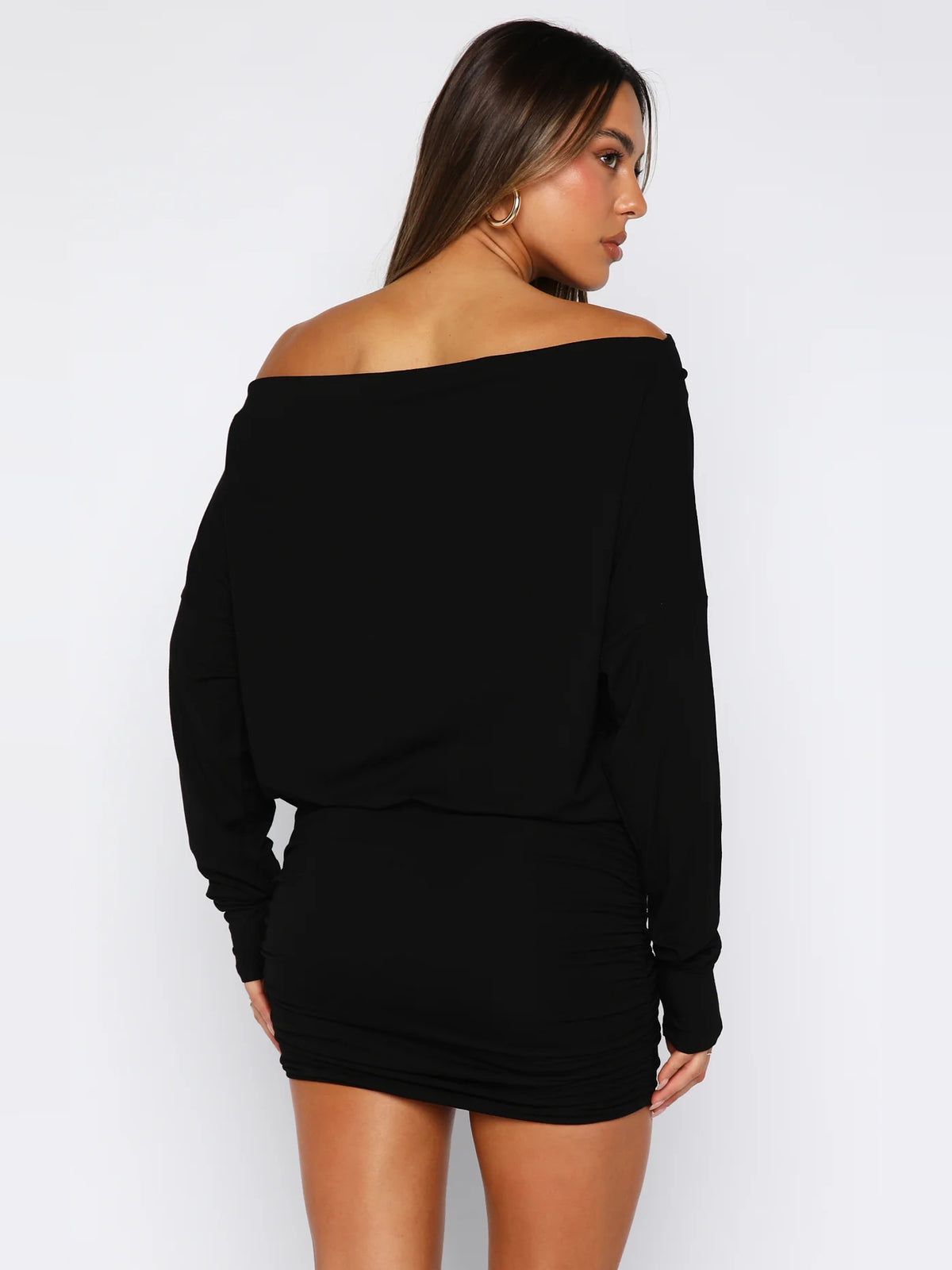 Black mini homecoming dress, alternate view showing the skirt and hem