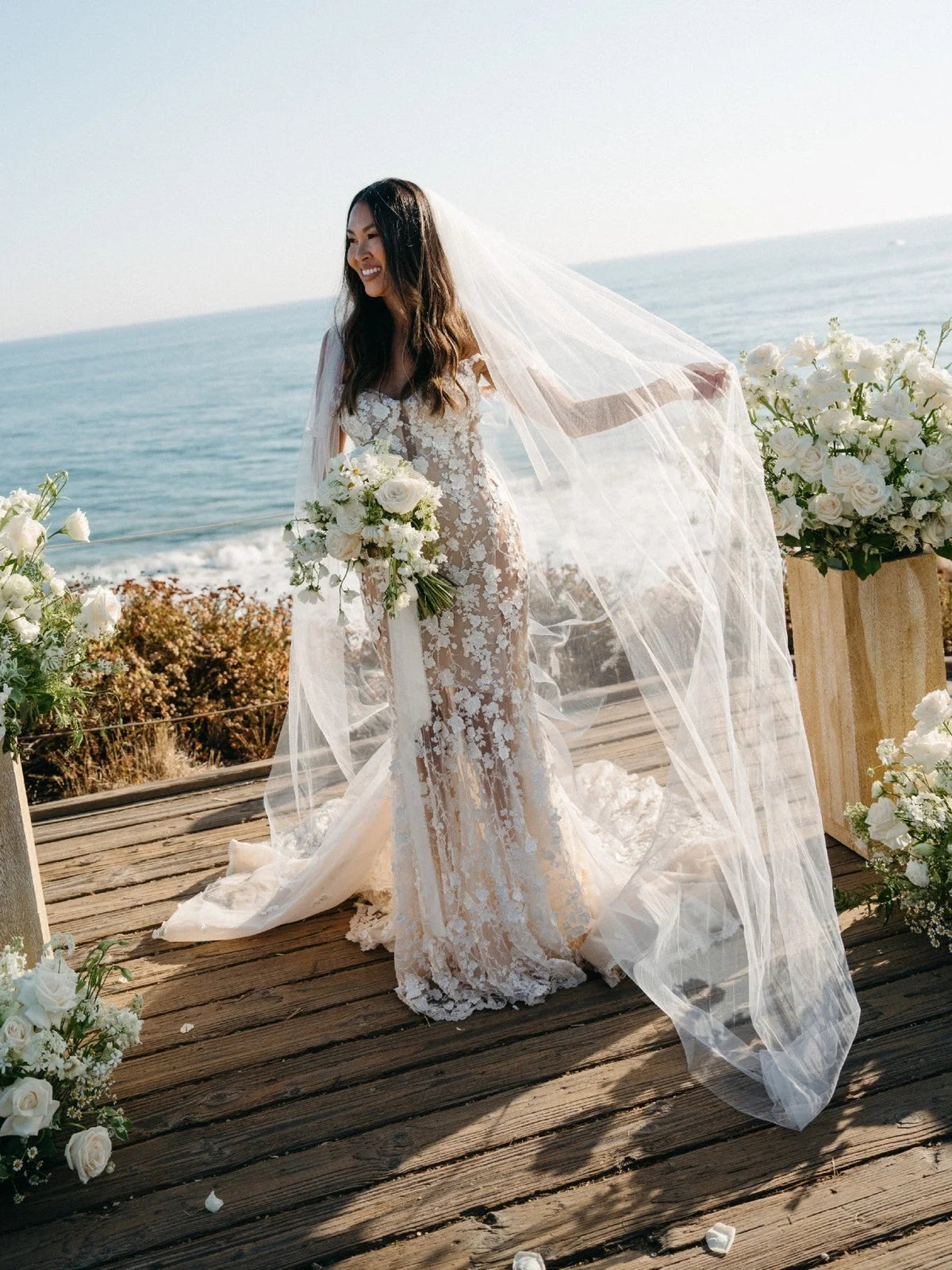 Ivory floor-length wedding dress, alternate view showing the skirt and hem
