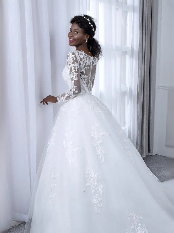 Ivory floor-length wedding dress, alternate view showing the skirt and hem