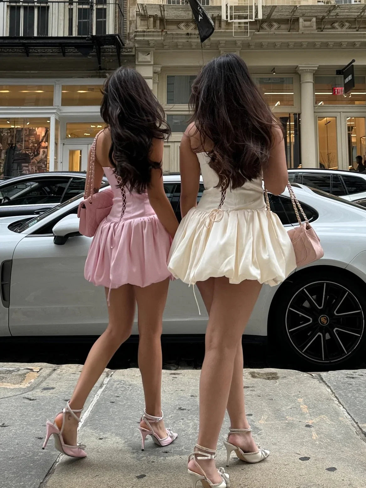 Pink mini homecoming dress, alternate view showing the skirt and hem