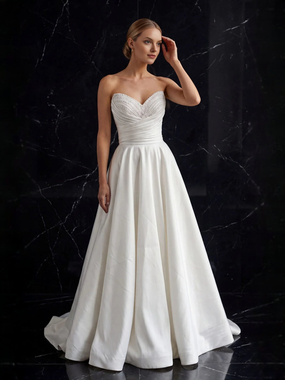 Ivory floor-length wedding dress, alternate view showing the skirt and hem