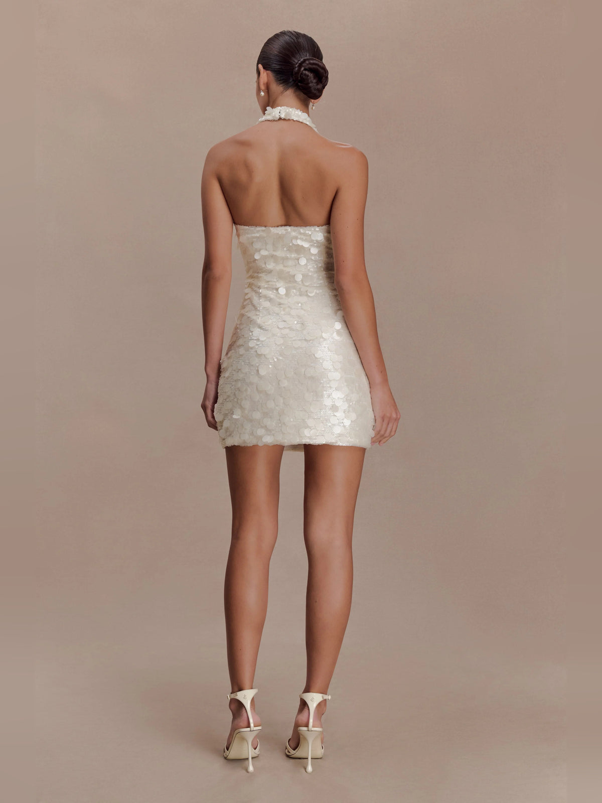 Ivory mini homecoming dress, alternate view showing the skirt and hem
