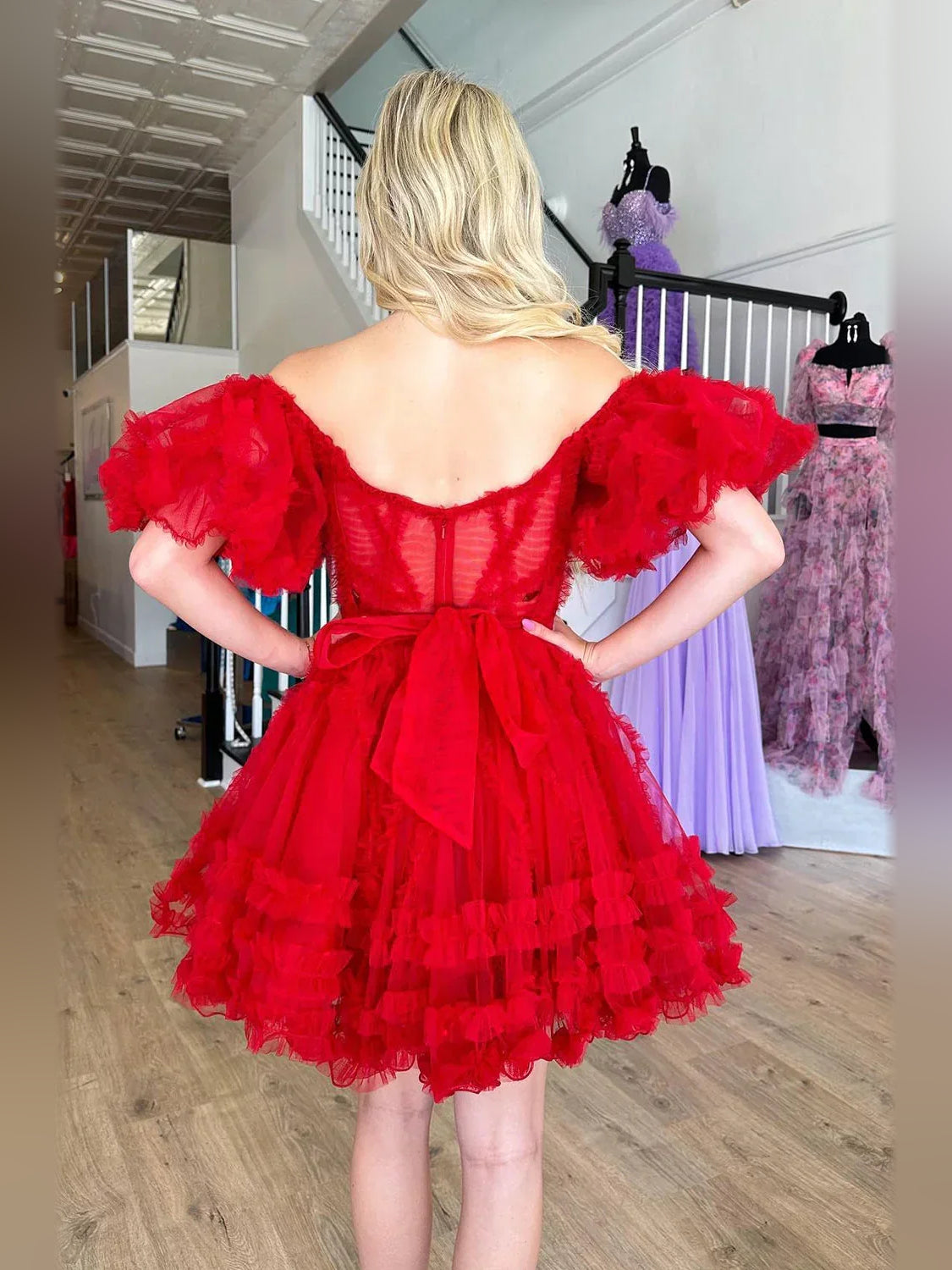 Pink mini homecoming dress, alternate view showing the skirt and hem