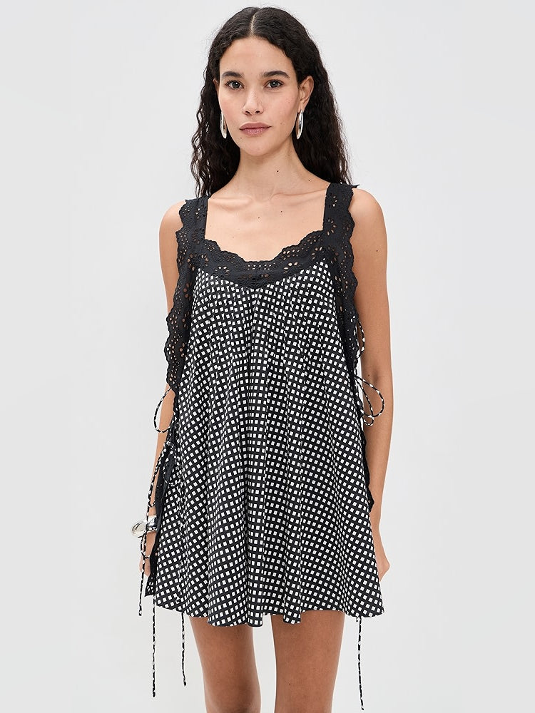 Orange mini homecoming dress, alternate view showing the skirt and hem