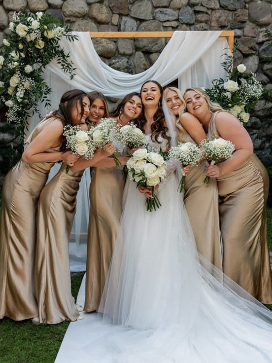 Champagne maxi bridesmaid dress, alternate view showing the skirt and hem