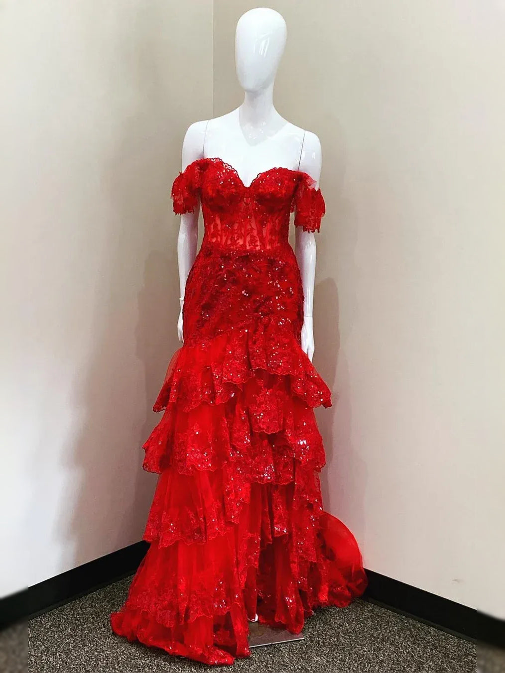 Red floor-length prom dress, alternate view showing the skirt and hem