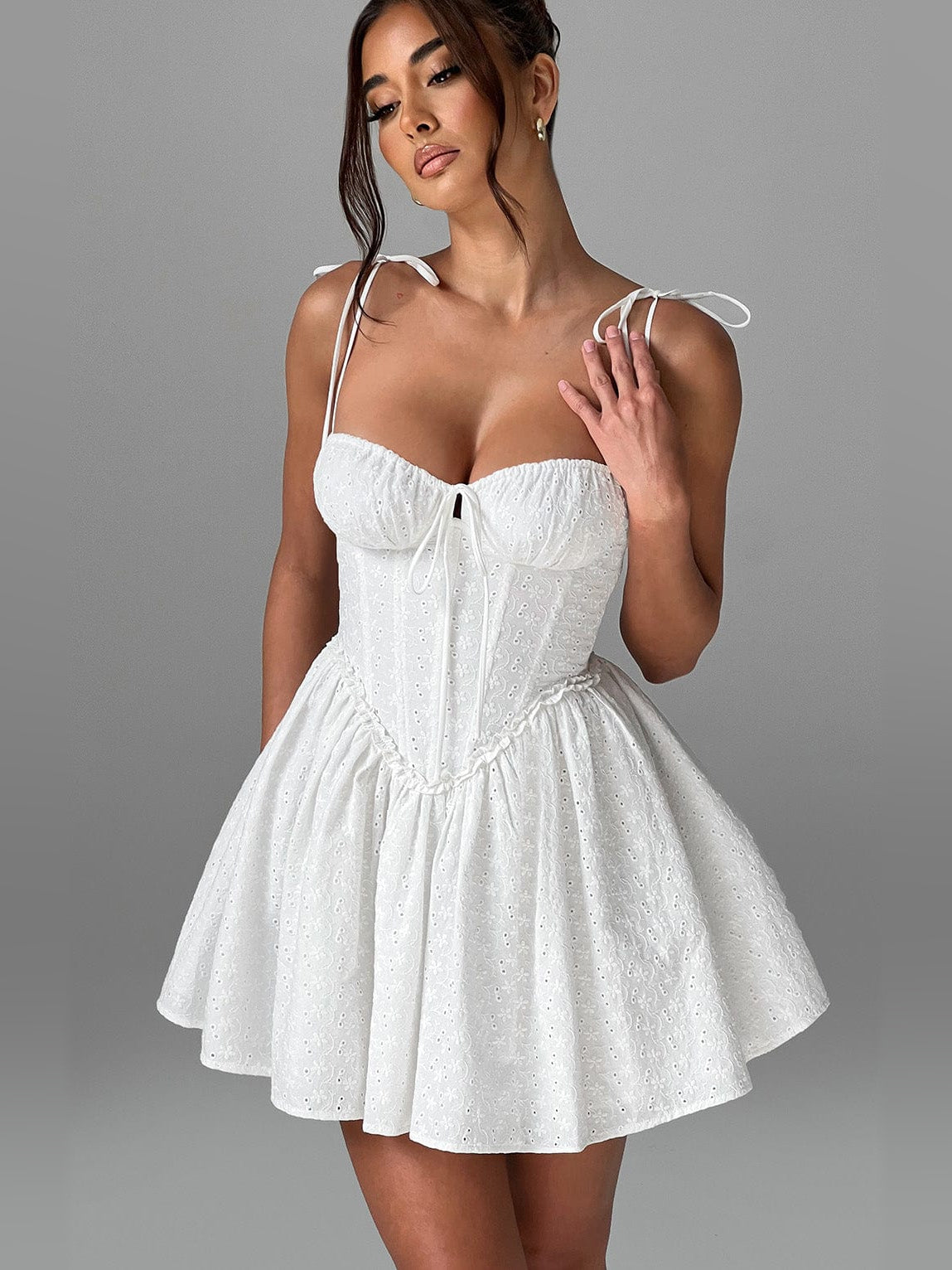 Ivory mini homecoming dress, alternate view showing the skirt and hem