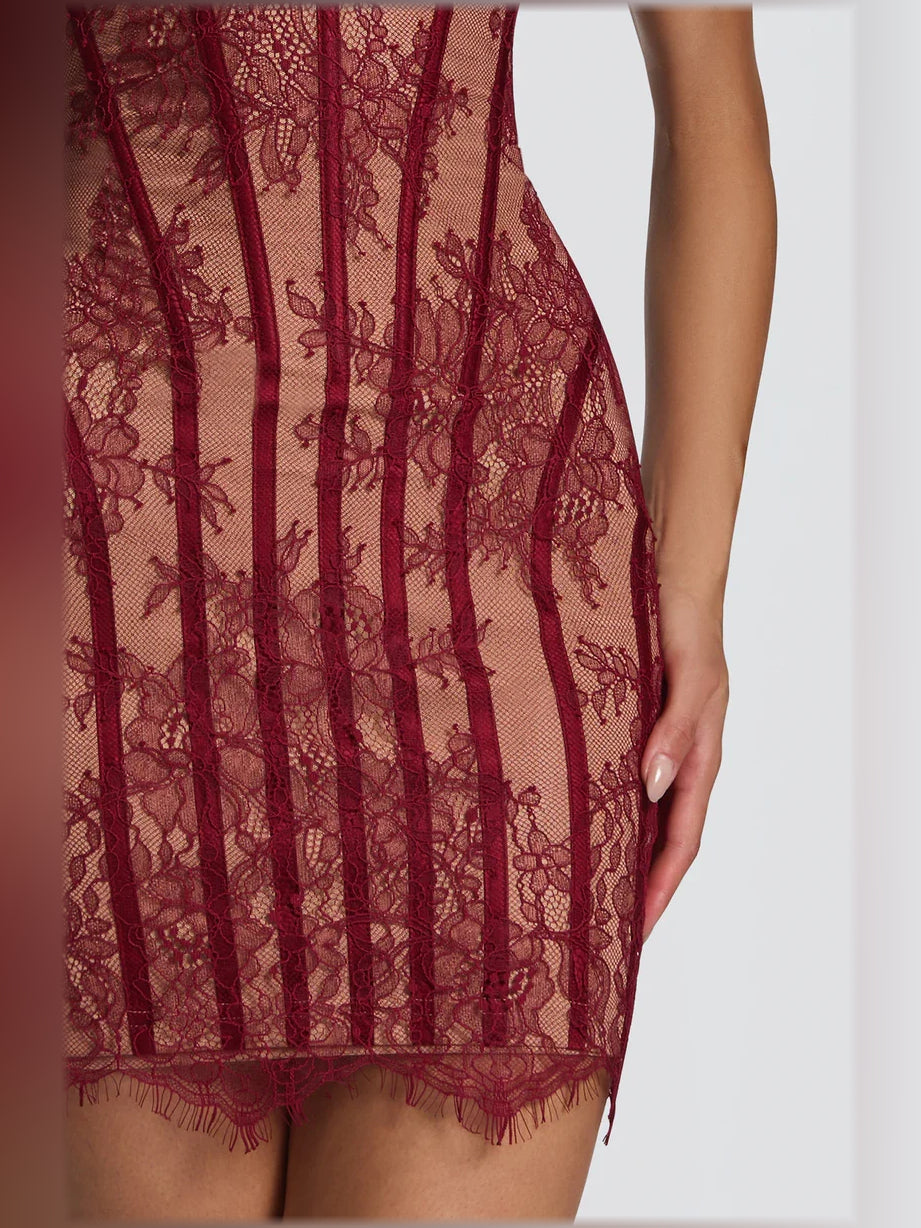 Black bodycon mini formal dress with floral print, alternate view showing the skirt
