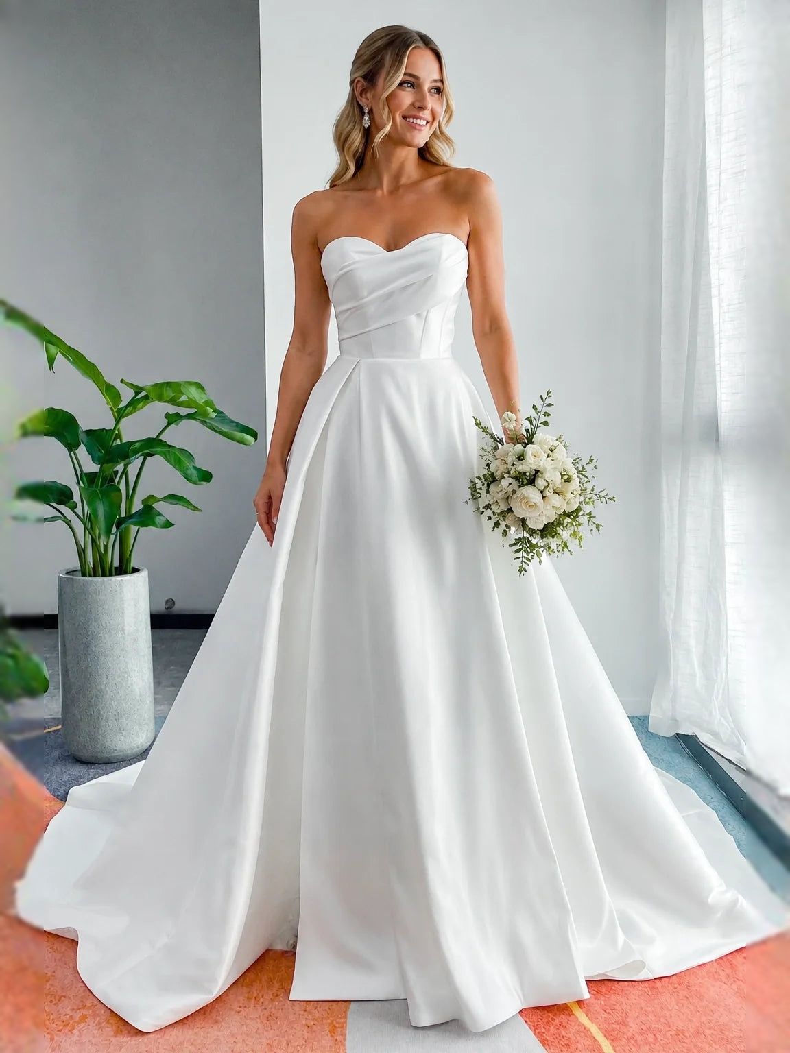White floor-length wedding dress, alternate view showing the skirt and hem