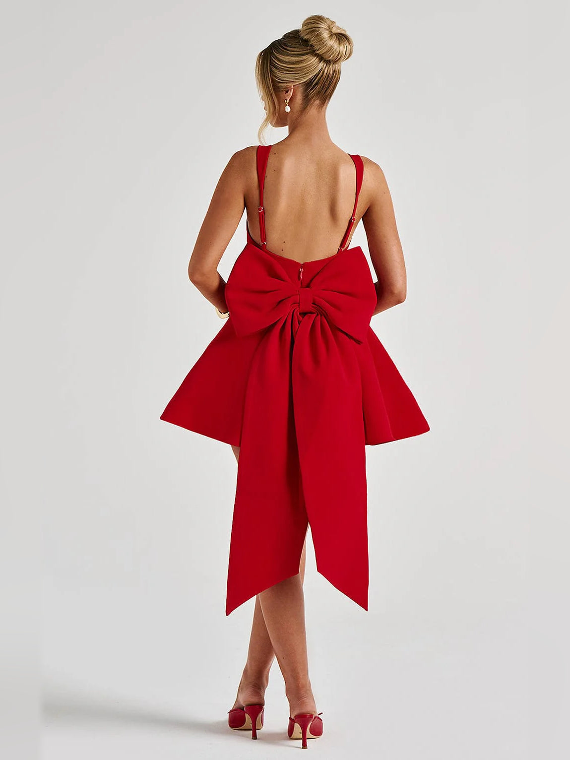 Red mini homecoming dress, alternate view showing the skirt and hem