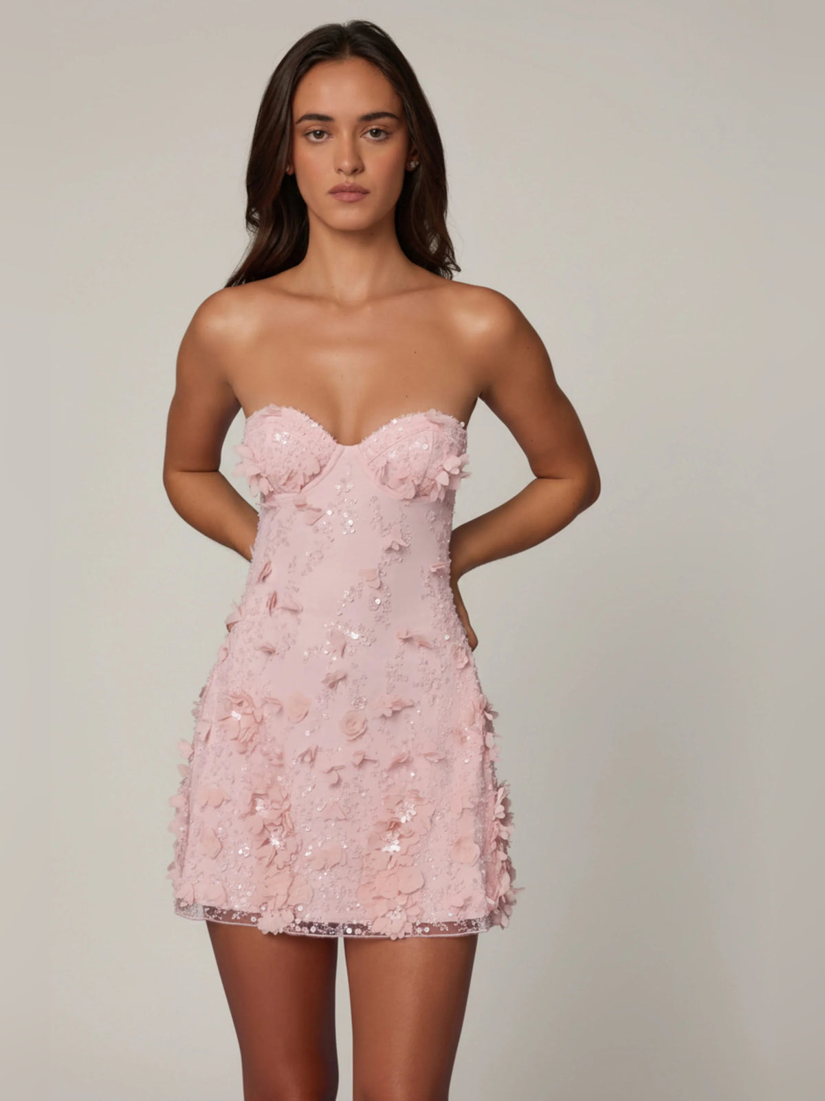 Pink mini homecoming dress, alternate view showing the skirt and hem
