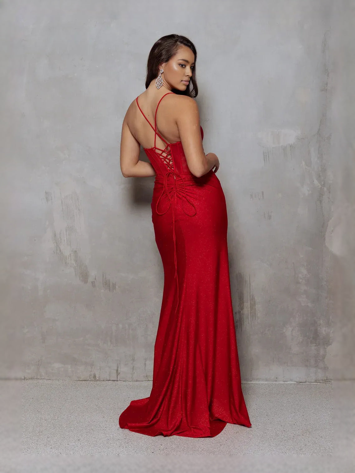 Ocean Blue floor-length prom dress, back view showing the rear of the dress in an additional pose