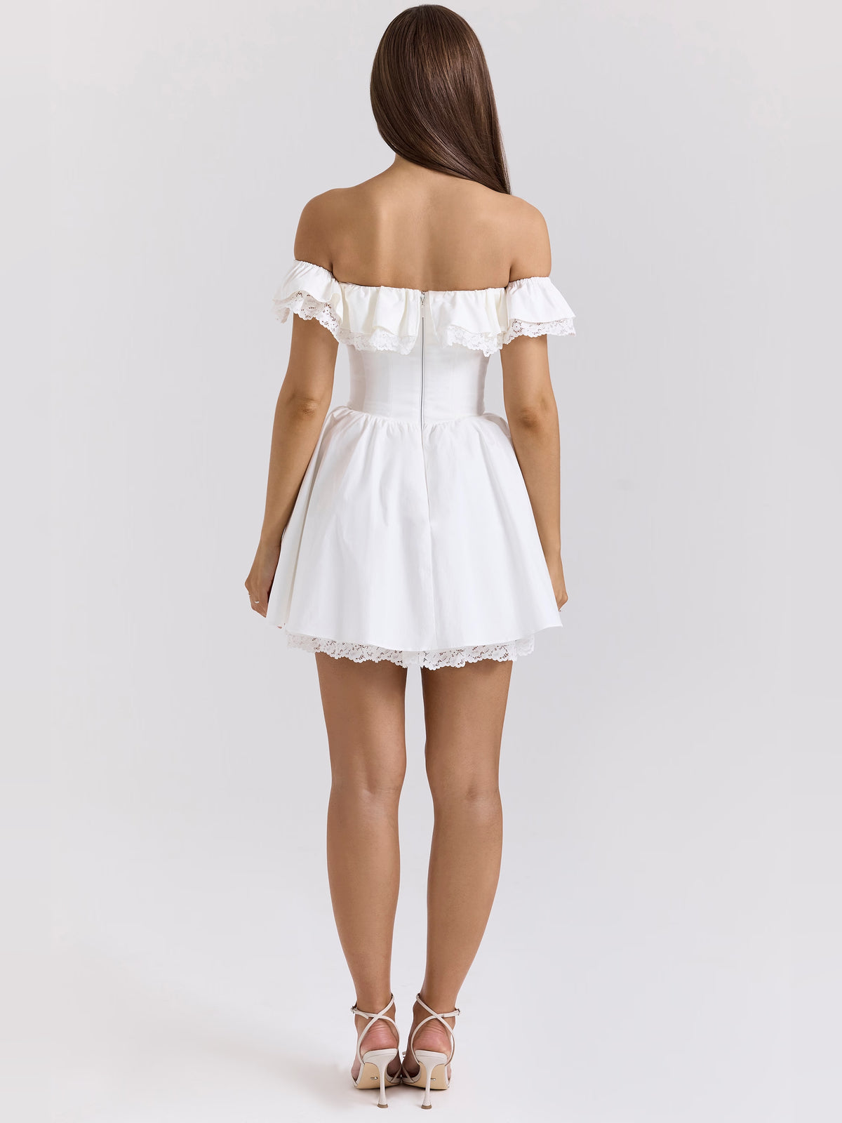 White mini homecoming dress, alternate view showing the skirt and hem