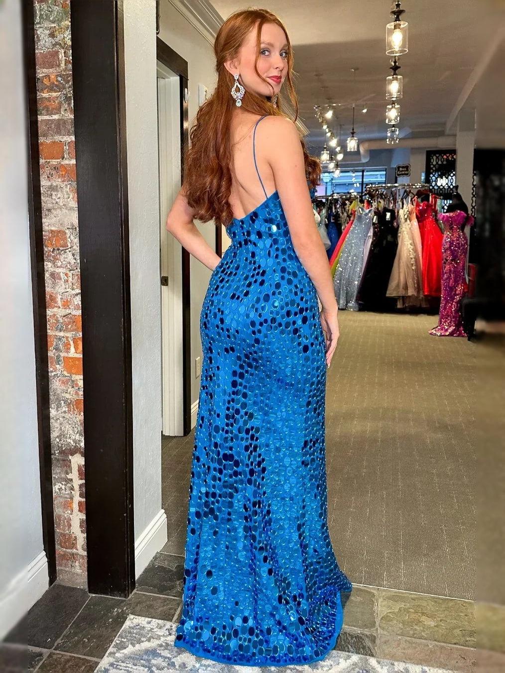 Fuchsia floor-length prom dress, alternate view showing the skirt and hem