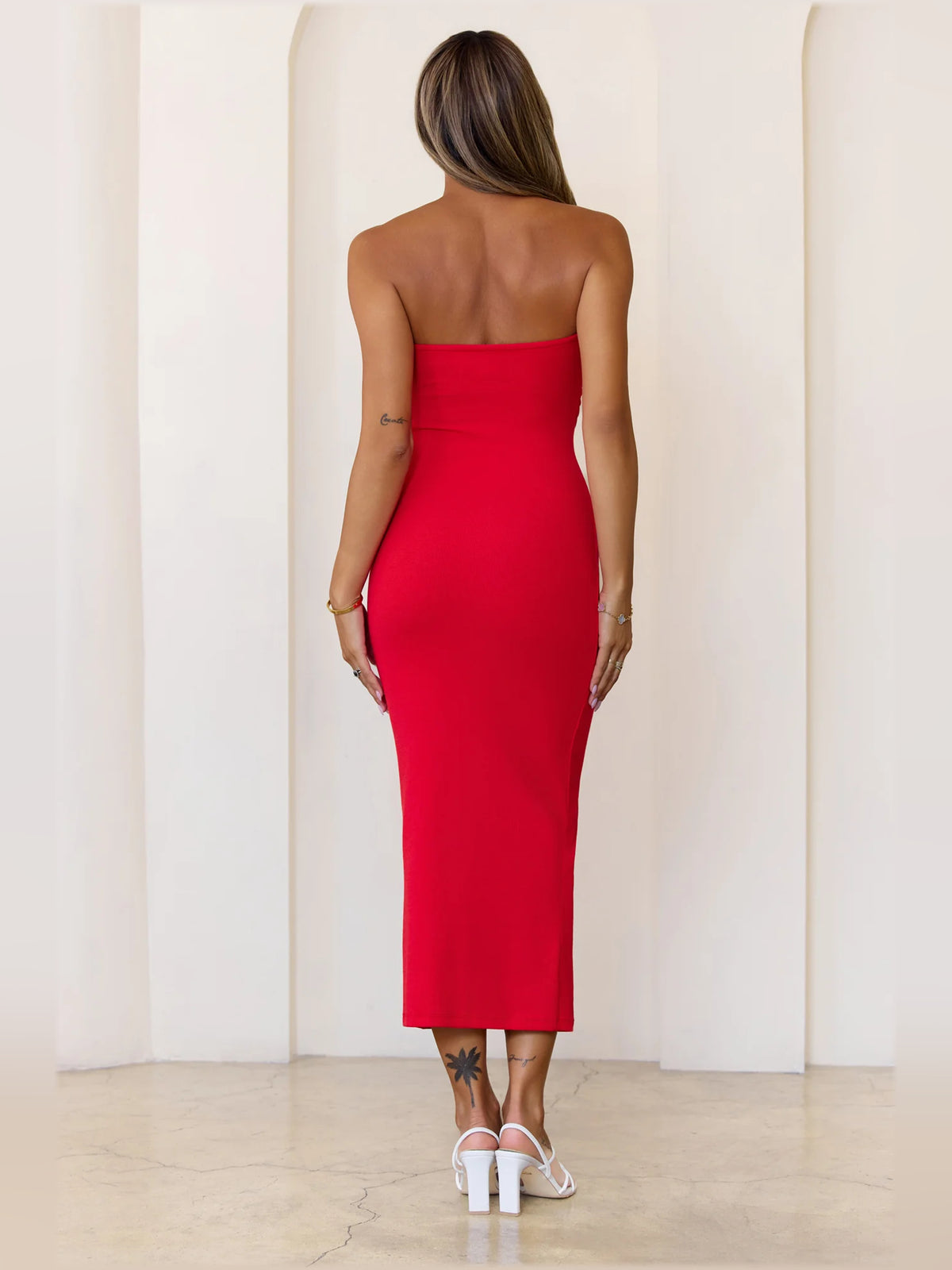 Red midi formal dress with strapless neckline, alternate view showing the skirt