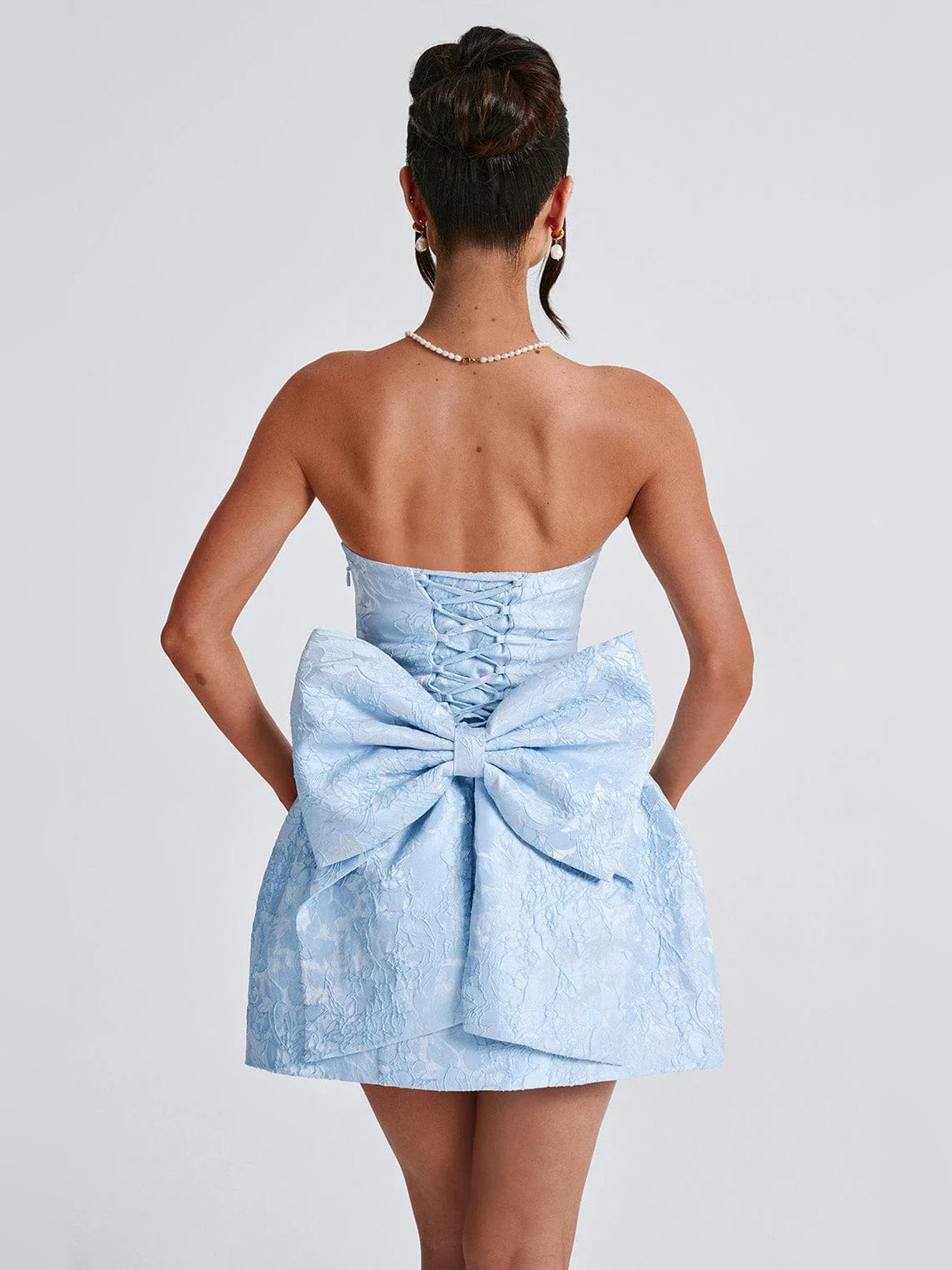 Blue mini homecoming dress, alternate view showing the skirt and hem