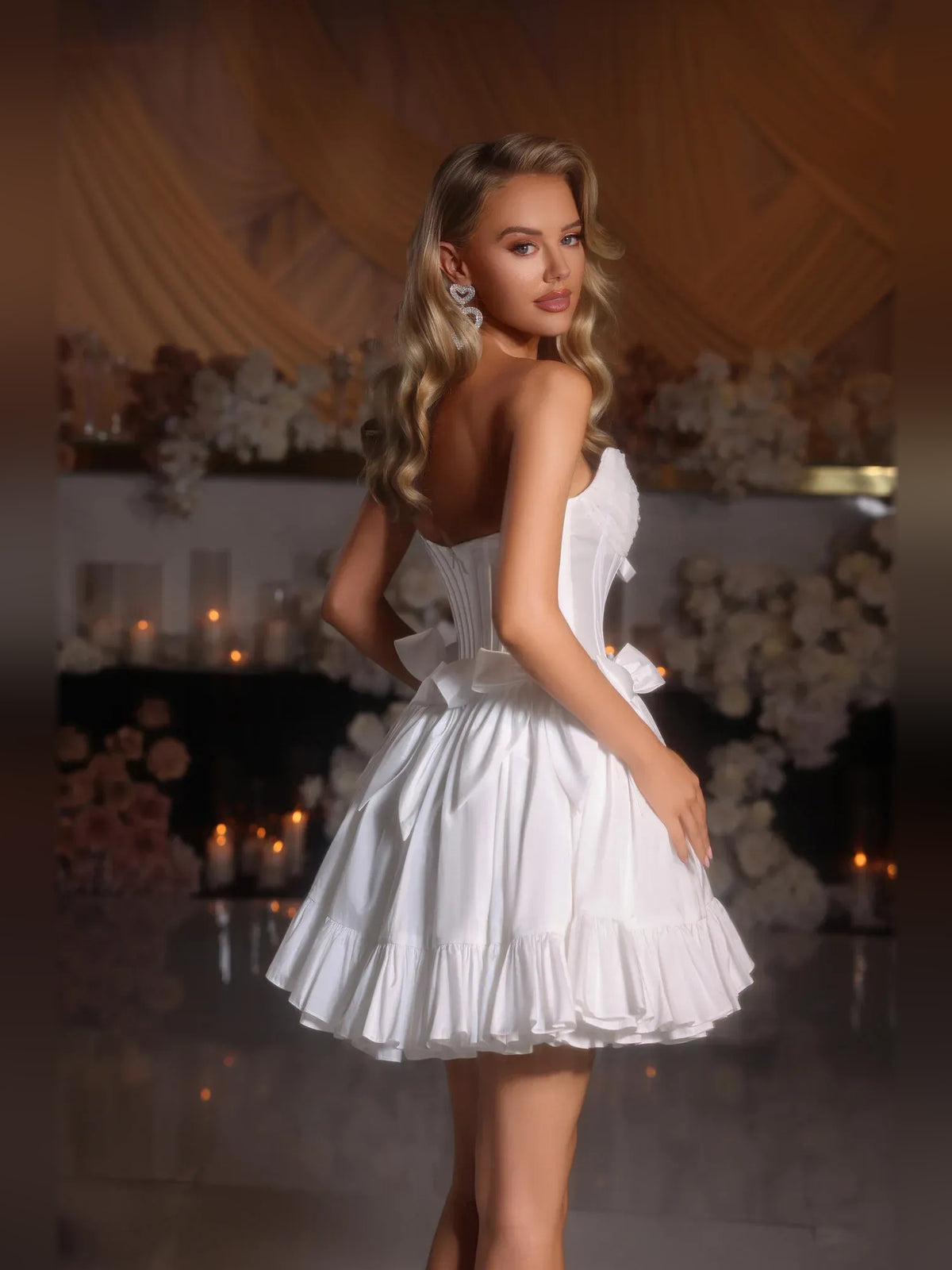 Black mini homecoming dress, alternate view showing the skirt and hem
