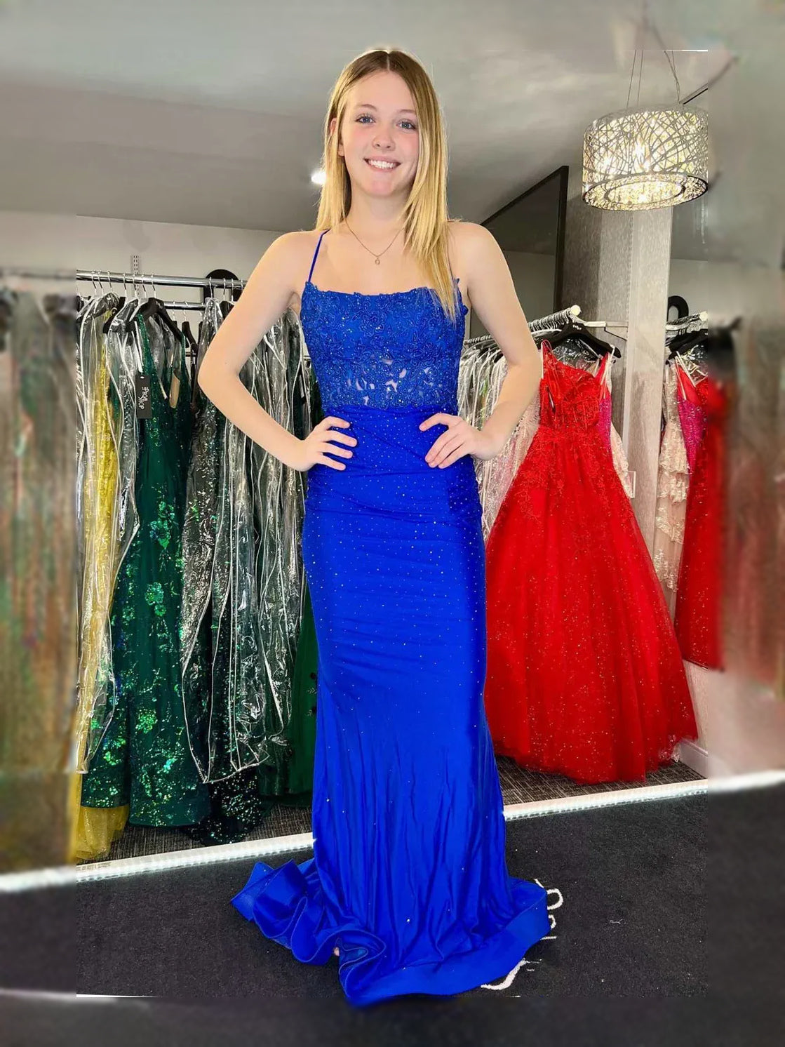 Emerald Green floor-length prom dress, back view showing the rear of the dress with the dress shown closer