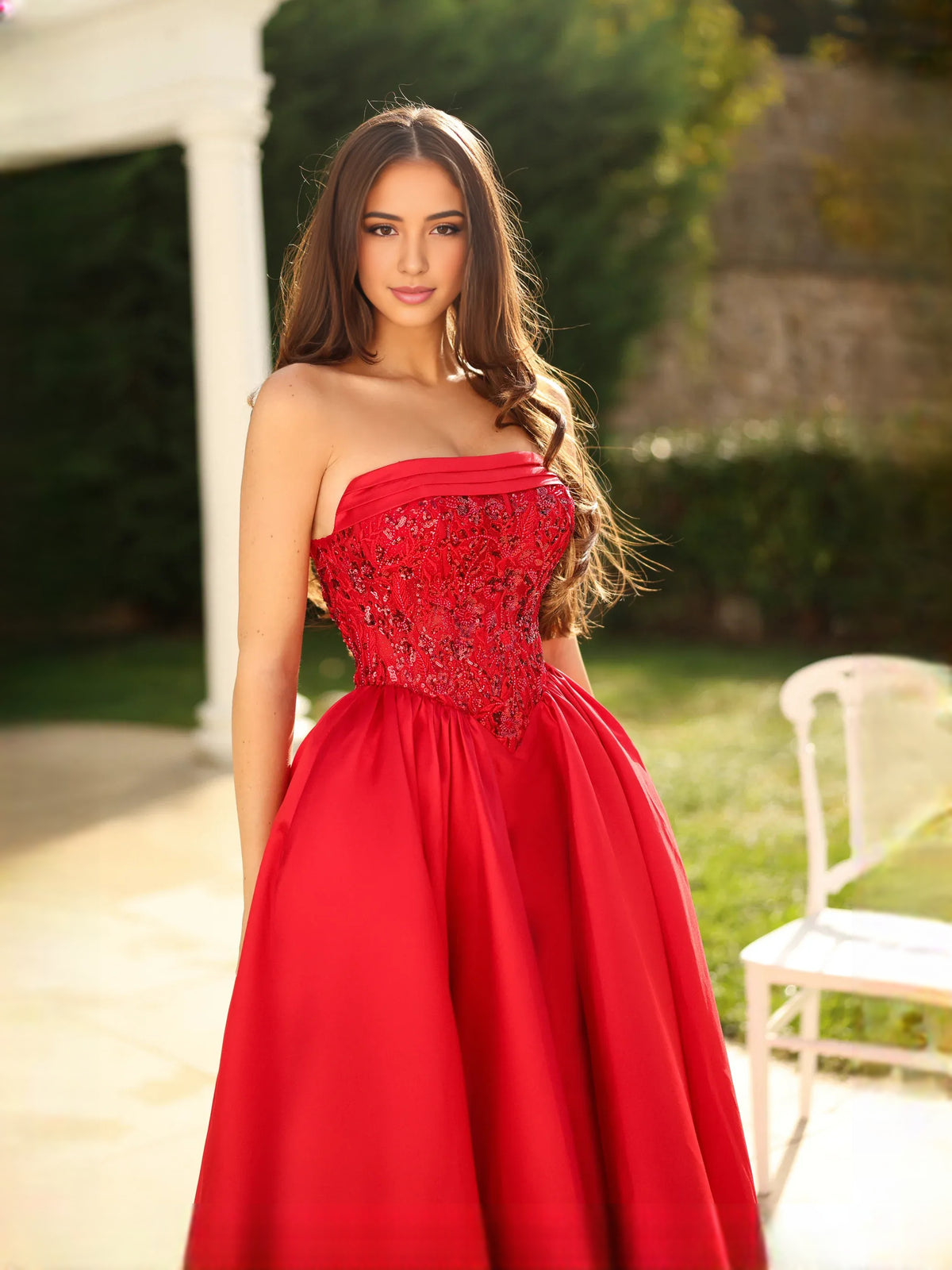 Red floor-length prom dress, alternate view showing the skirt and hem