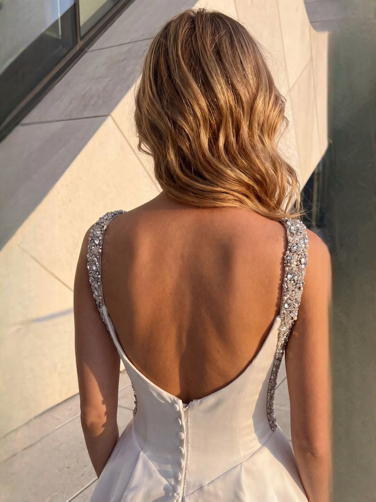 White floor-length wedding dress, alternate view showing the skirt and hem
