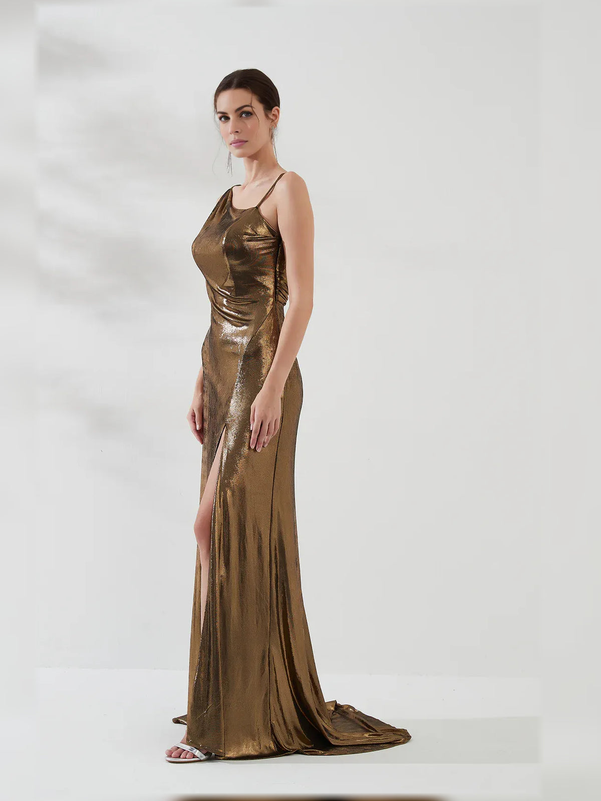 Gold mermaid floor-length formal dress with skirt slit, alternate view showing the skirt