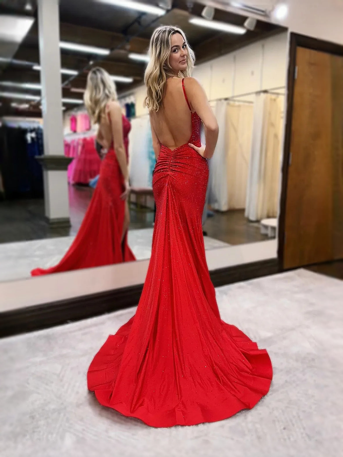 Royal Blue floor-length prom dress, back view showing the rear of the dress with the dress shown closer