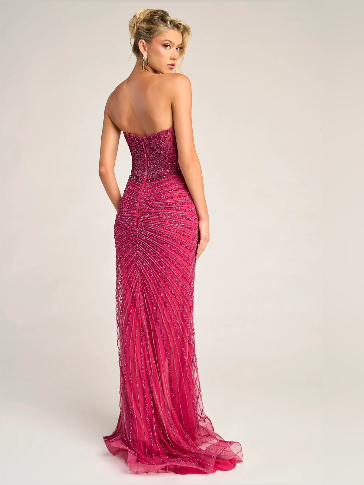 Red mermaid floor-length formal dress with skirt slit, alternate view showing the skirt