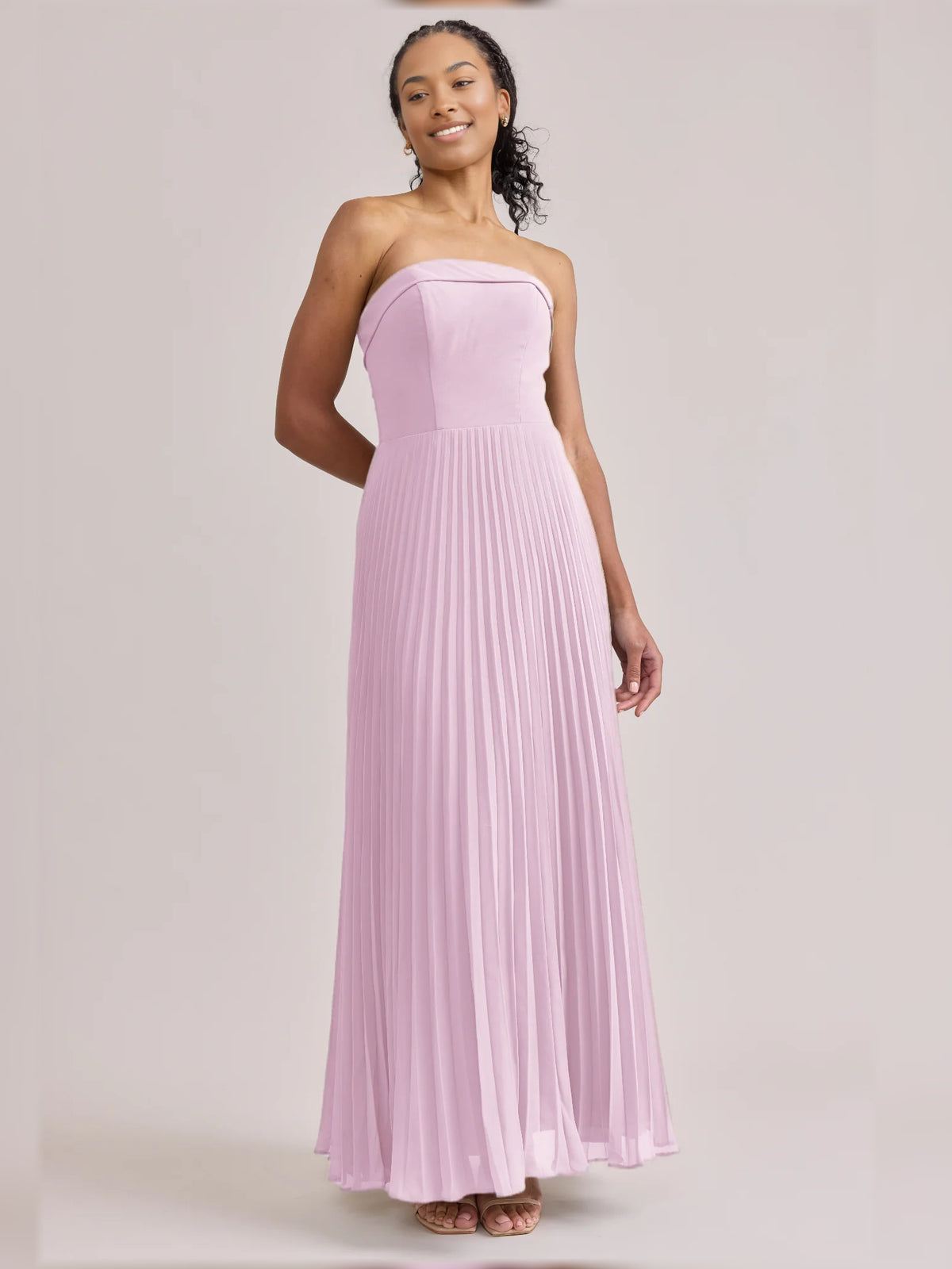 Pink maxi bridesmaid dress, alternate view showing the skirt and hem