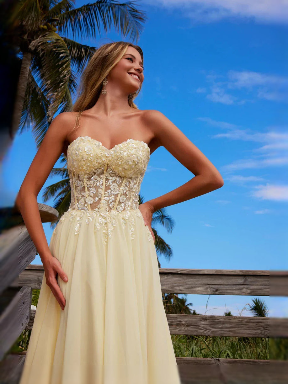 Pink floor-length prom dress, alternate view showing the skirt and hem