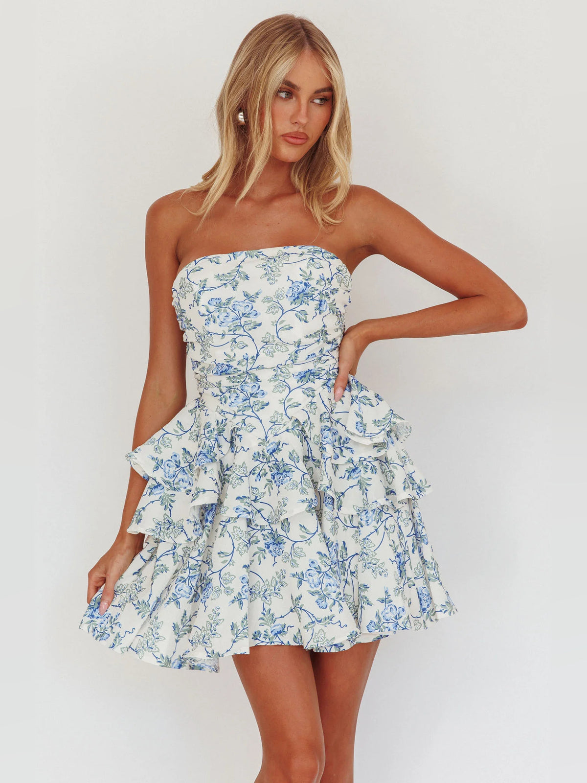 Blue mini homecoming dress, alternate view showing the skirt and hem