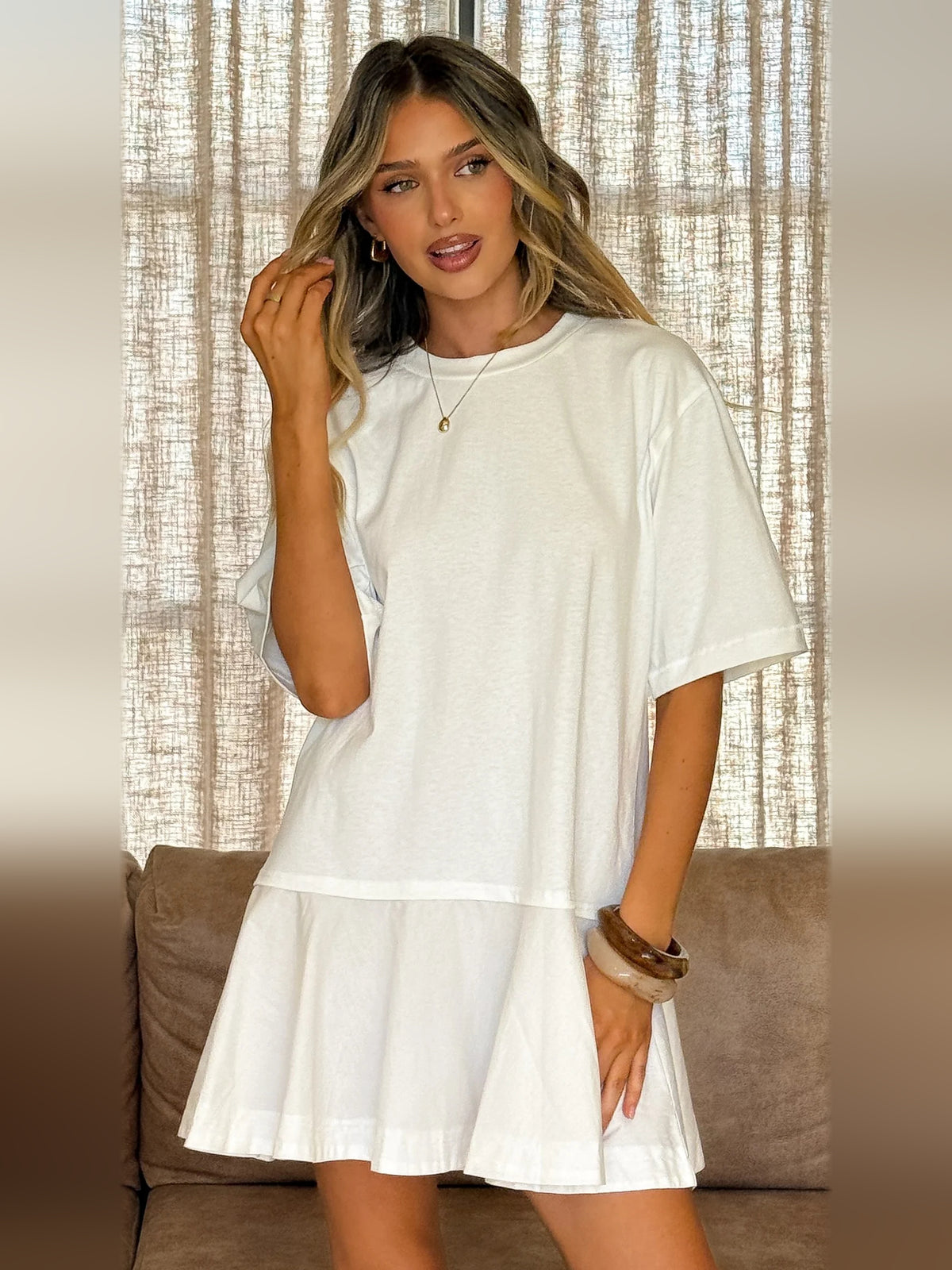 Off White mini homecoming dress, alternate view showing the skirt and hem
