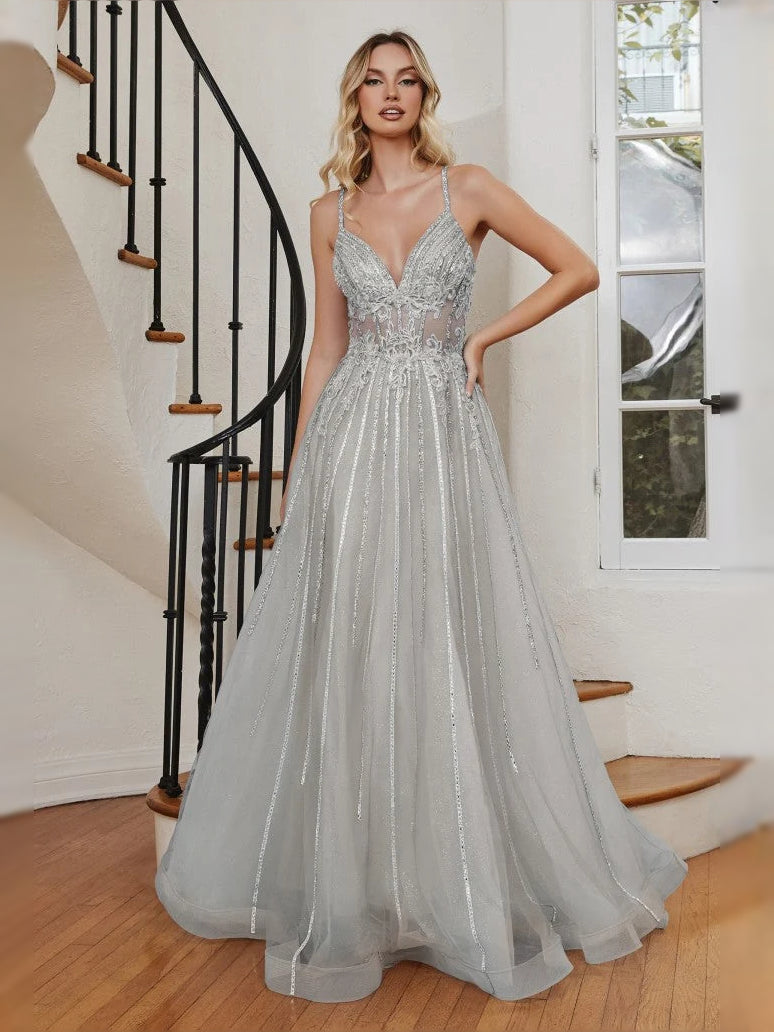 Silver floor-length prom dress, alternate view showing the skirt and hem