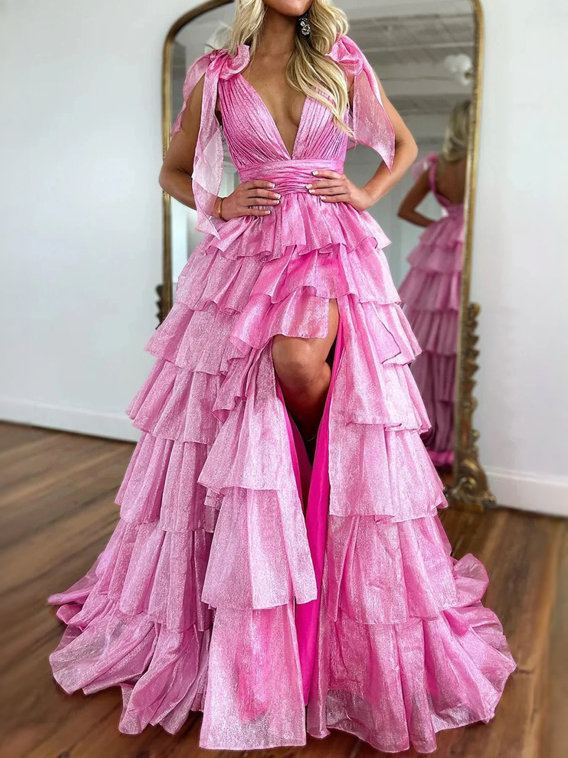 Pink maxi prom dress, back view showing the rear of the dress with the dress shown closer