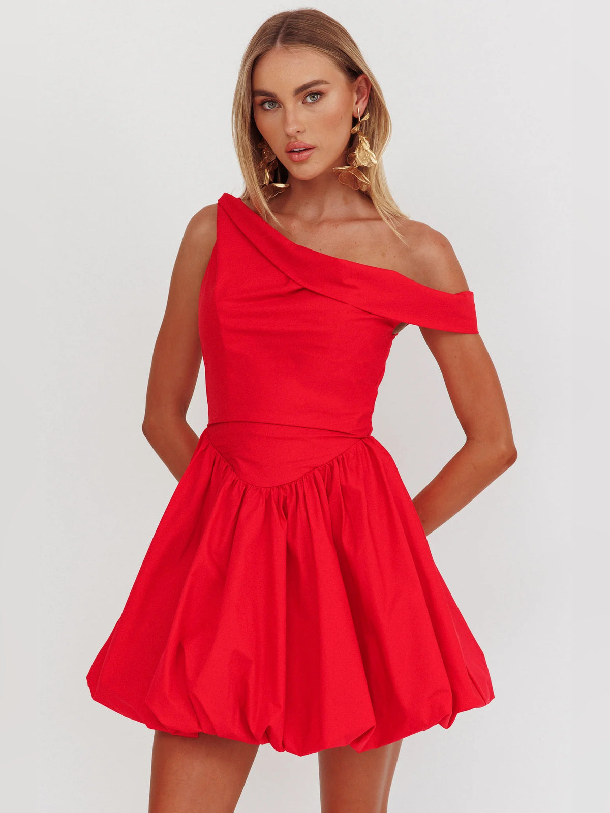 Red mini homecoming dress, alternate view showing the skirt and hem