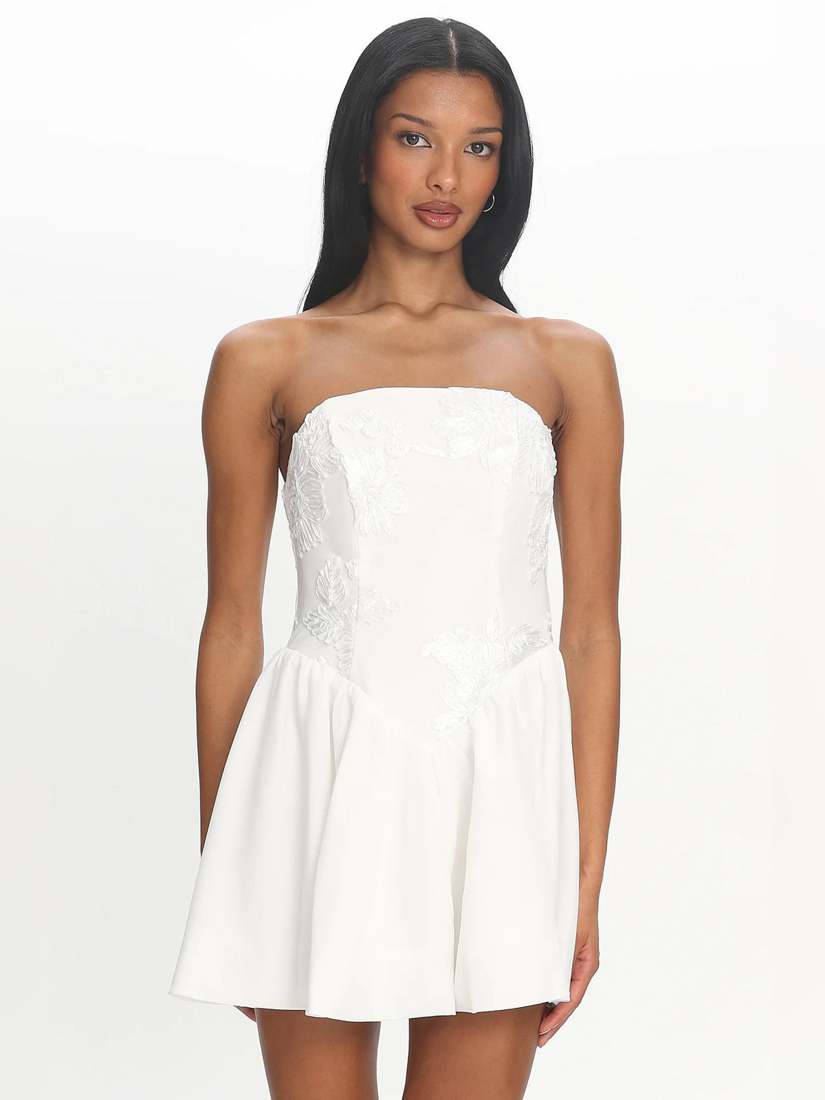 White mini homecoming dress, alternate view showing the skirt and hem