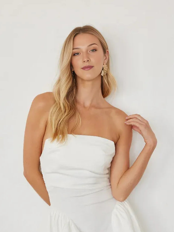 White mini homecoming dress, alternate view showing the skirt and hem