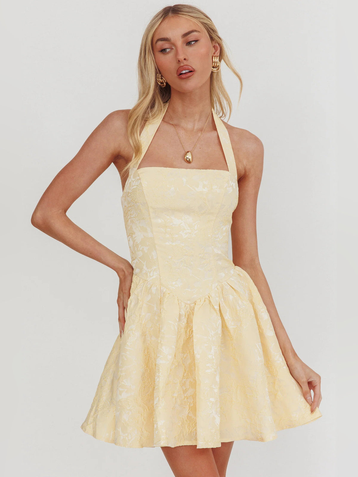 Butter mini homecoming dress, alternate view showing the skirt and hem