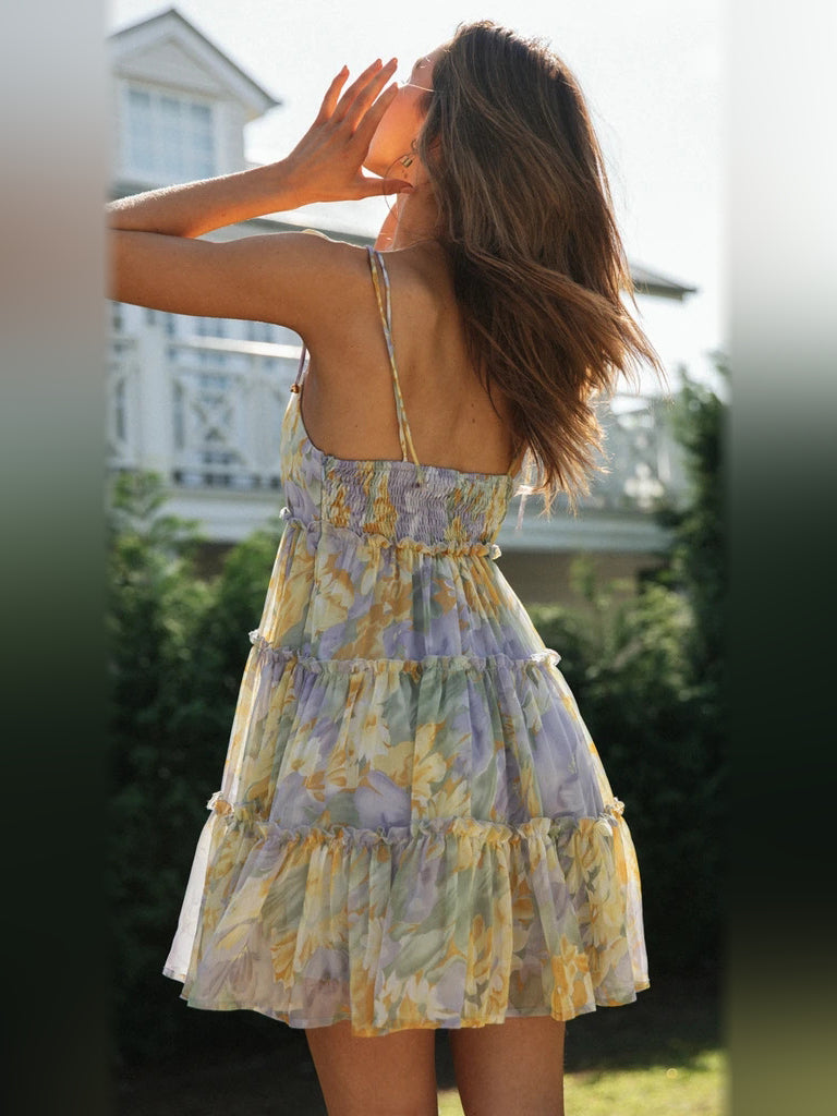 Floral mini homecoming dress, alternate view showing the skirt and hem