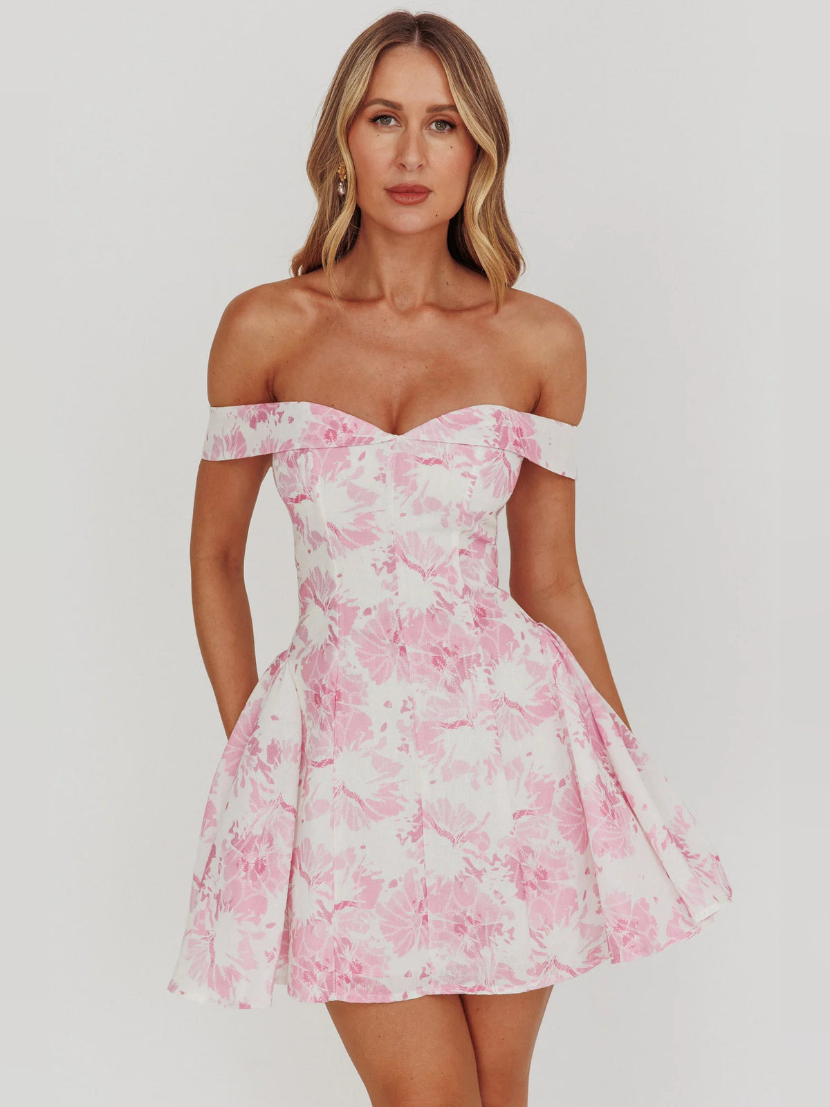Pink mini homecoming dress, alternate view showing the skirt and hem