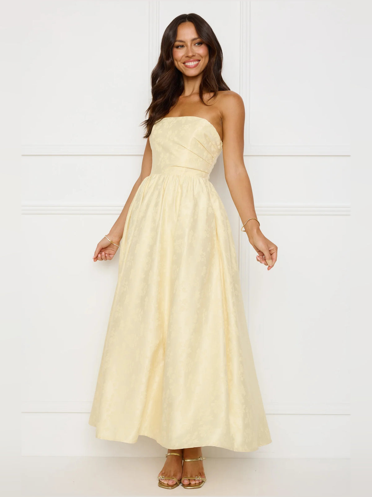 Yellow a-line maxi formal dress with strapless neckline, alternate view showing the skirt
