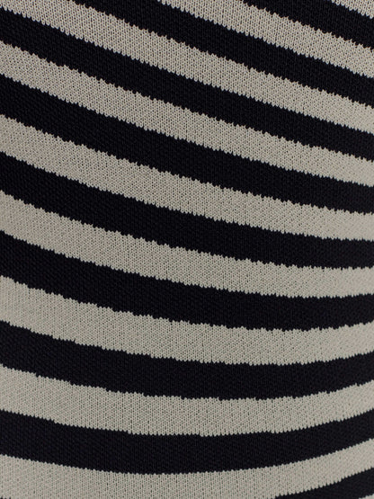 White midi formal dress with printed pattern, alternate view showing the skirt