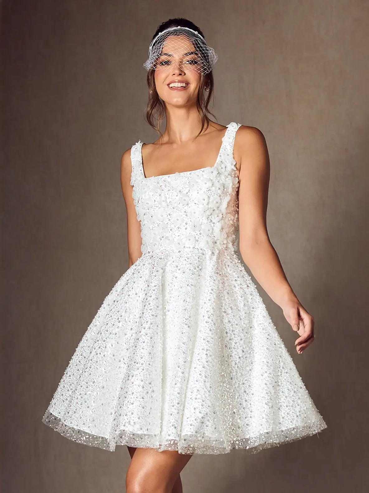 White mini wedding dress, alternate view showing the skirt and hem